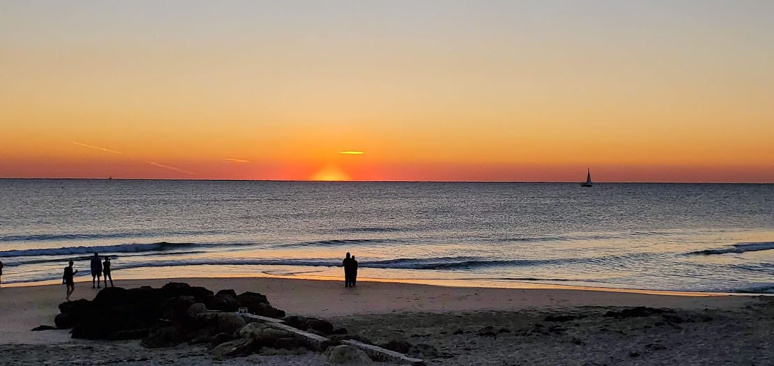 Just-married couple at their Florida beach wedding